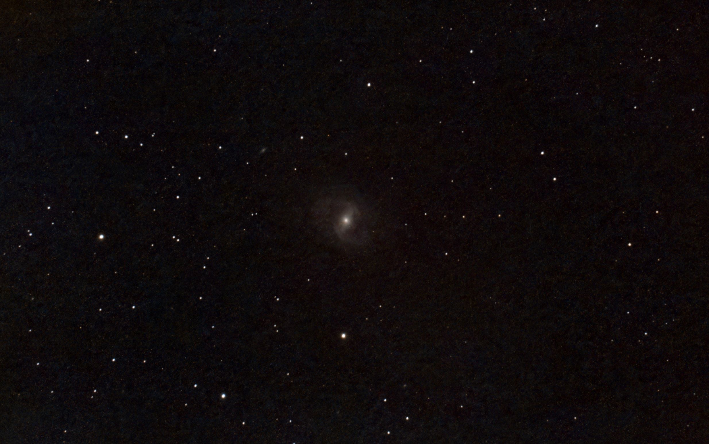 Barred Spiral Galaxy in Coma Berenices